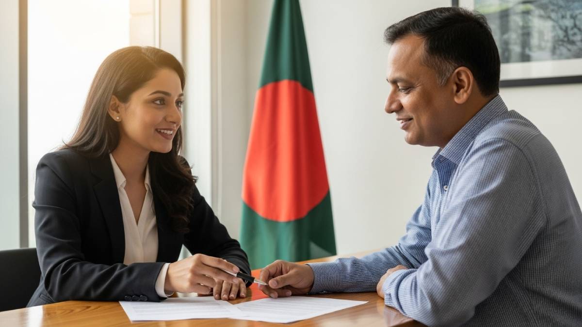 Traducteur avec client bengalophone, bureau moderne, drapeau du Bangladesh bien visible