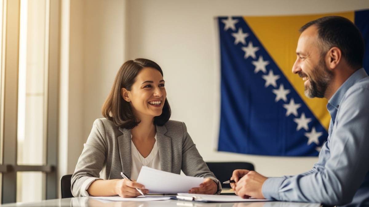 Traducteur et client bosnien souriants, documents en main, drapeau bosnien bien visible