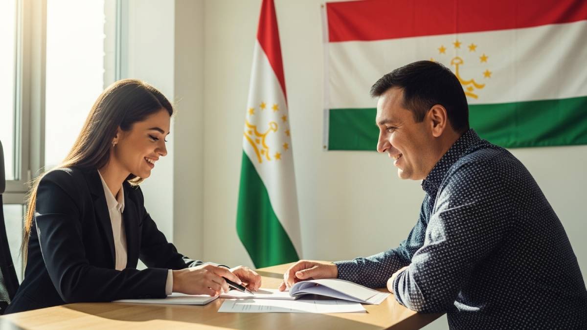 Translator with Tajik client, bright office, Tajikistan flag clearly visible